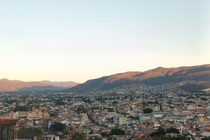 Bicycle Tour through Oaxaca learning about its Urban Art and History - Cerro del Fortín viewpoint: panoramic photos and a Benito Juárez pass-by