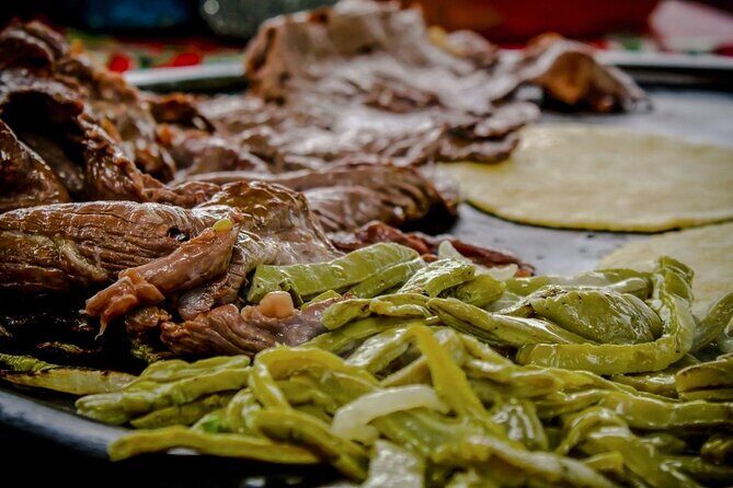 Food & Markets Tour - Mercado 20 De Noviembre: Roasted Meats, Tamales, Tlayudas, and the Real Payoff